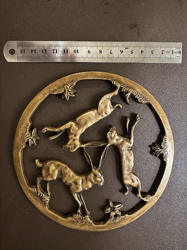 Three hares window brass - "three,