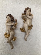 Putten, zwei musizierende